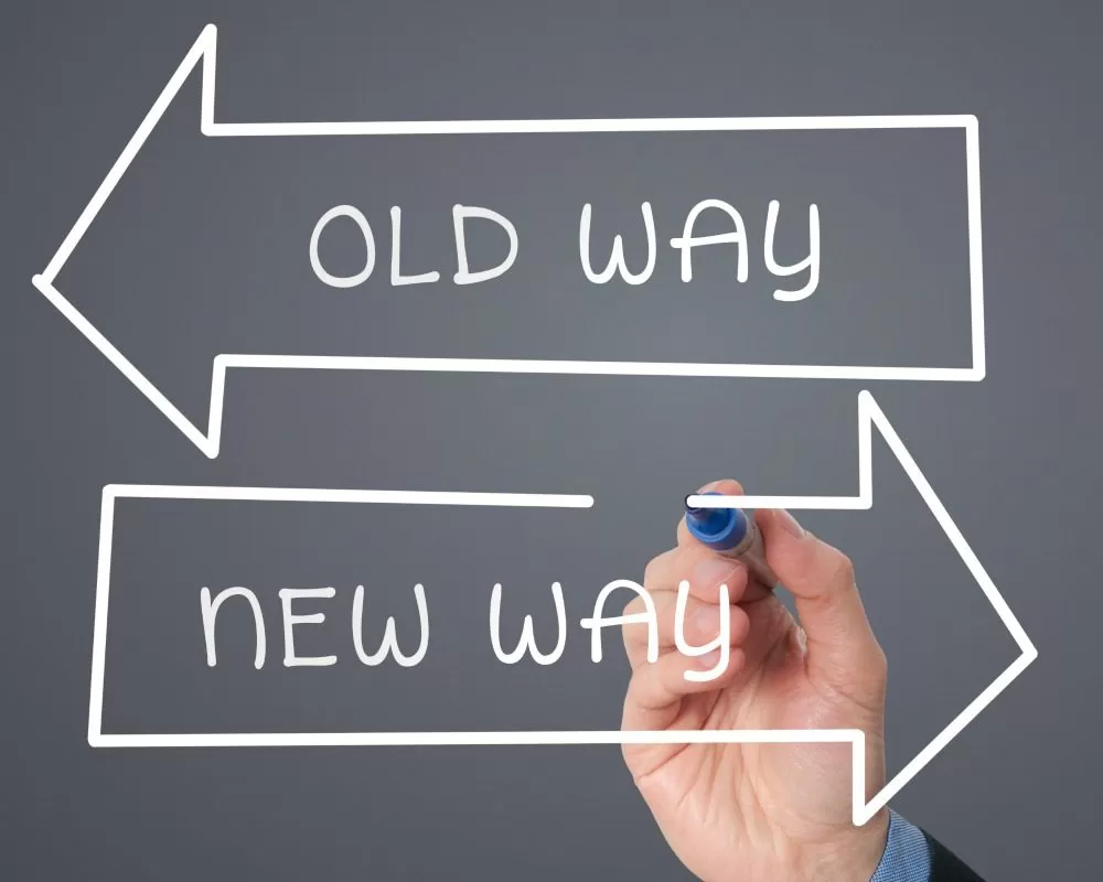 Two arrows depicting the old way as backwards and the new way as forwards.